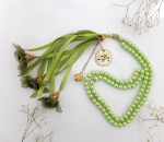 تسبیح صد دانه گل دار با پلاک یا امیرالمومنین (ع)