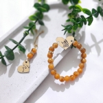 دستبند به همراه گیره روسری طرح های فاطمه زهرا (س) - رنگی