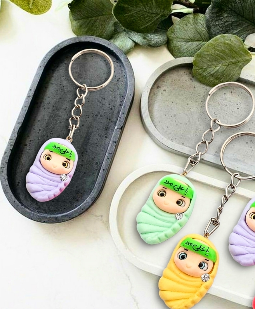 تصویر  جاسوئیچی عروسکی طرح یا علی مدد - دخترانه