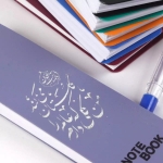 دفترچه یادداشت خط دار طرح من گلی دارم عالم را گلستان می کند