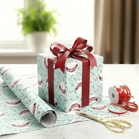 کاغذ کادو عید مبارک آبی روشن گل گلی- کد 425- فروشگاه دیدار